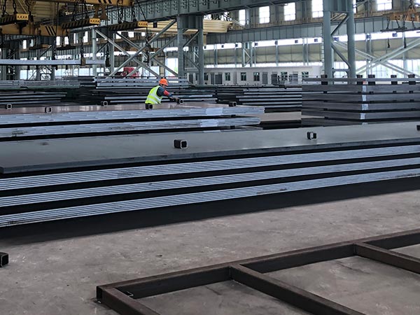 What is the main function of SA573 Grade 65 carbon steel plate